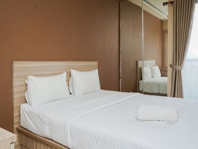 Modern and Relax Studio Room at Serpong Greenview Apartment by Travelio