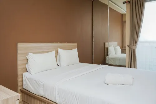 Modern and Relax Studio Room at Serpong Greenview Apartment by Travelio - ที่มีสระว่ายน้ำ