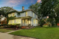 Historic house on tree lined red brick street of historic homes. - WiFi