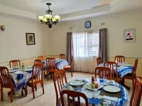 Home up Guest Apartments and Lodge