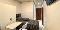 SW Co-Living Palembang - Deluxe Twin Room