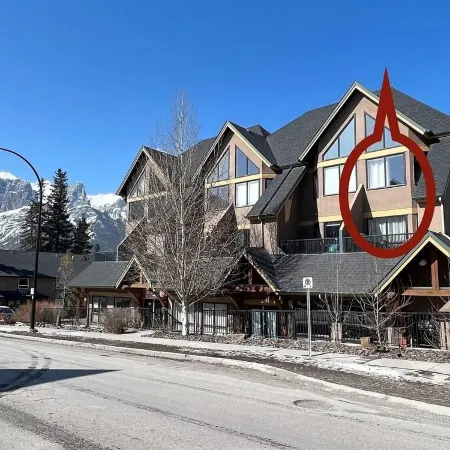 Spectacular Mountain Views! Unique & Rare End Unit 2 Storey Condo + 2 balconies!
