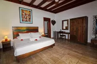 Takamaka Green Village Hotels near Anse Intendance