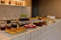 Neo Suites - servizio colazione