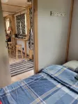 Tiny House with Stunning Mountain Views, 5 Min Forested Trail Walk to Arrow Lake - 2-Star