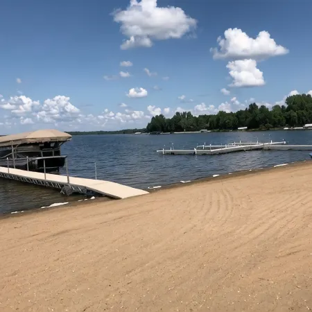 Gorgeous sunsets and a sugar sand beach in the heart of lakes country await you!