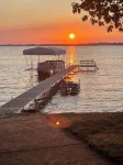 Enjoy this beach front lake home that boasts 66' of frontage with many amenities