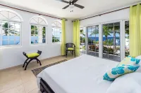 Luxury oceanfront villa, full AC private pool, direct ocean access, great diving