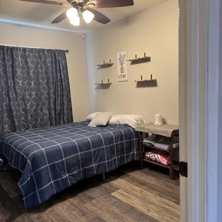 Charming 3-bedroom pet friendly house with fenced in yard in Clinton, IA.