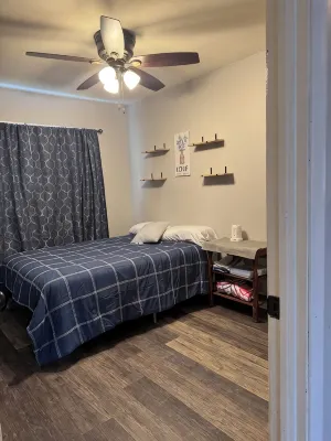 Charming 3-bedroom pet friendly house with fenced in yard in Clinton, IA.