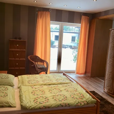 Vacation apartment directly on the lake with private access.