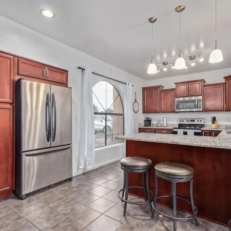 Your Home Away! Offering Free Heated Pool ! Close to Almost Everything!