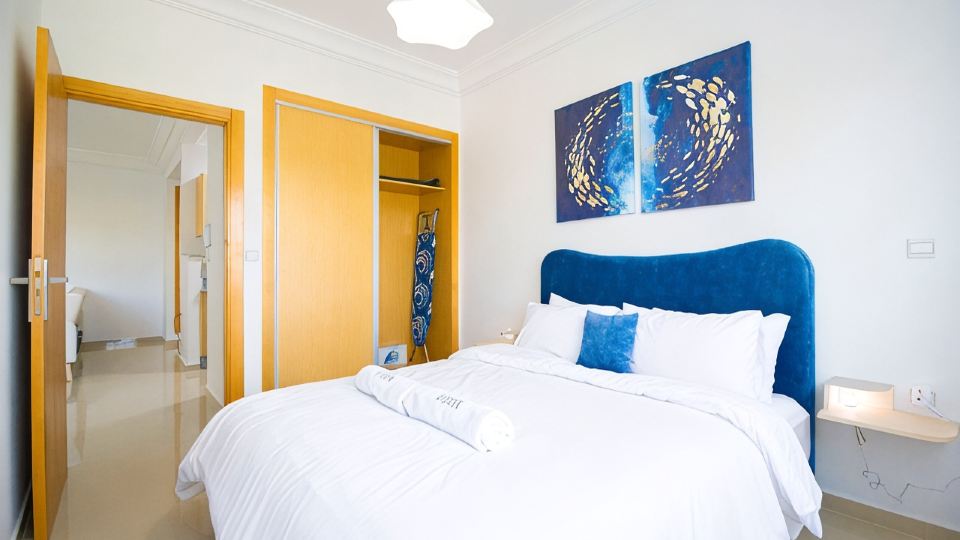 Bright Blue Retreat | Balcony & Pool