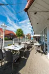Landhotel Butjadinger Tor - Lemmikkieläimet sallittu
