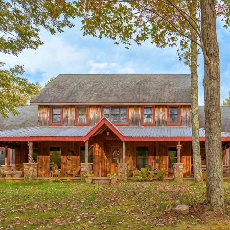 Beautiful spacious country home set on 22 acres that sleeps 27 people.
