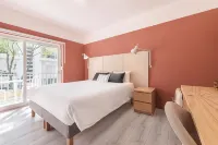 Rainbow Suites by Olala Homes