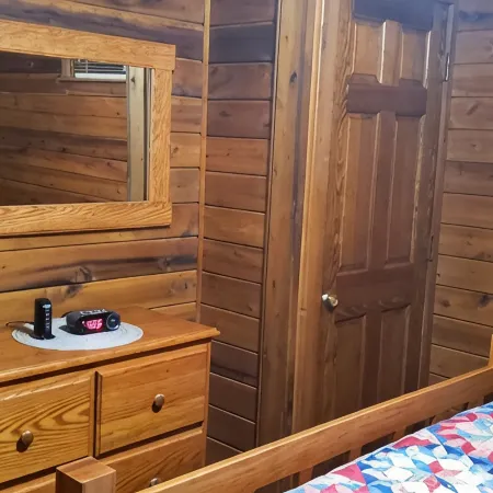 Adventurer's  Lodge, a charming 3-bedroom cabin with WiFi in quiet Lansing, WV.