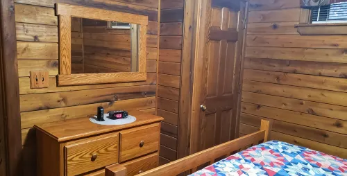Adventurer's  Lodge, a charming 3-bedroom cabin with WiFi in quiet Lansing, WV.