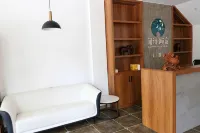 Wenshi Qingsu Homestay - Inns