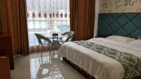 Yinjiang Xinyi Business Hotel - Inns