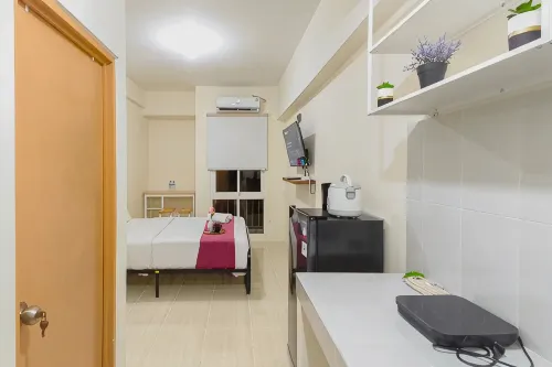 Comfy and Serene Studio Room at Bale Hinggil Apartment By Travelio