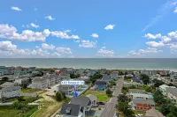 4 bedroom home with private pool. Close walk to beach and beautiful marsh views. - 4-Star