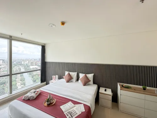 Lovely and Vibrant 2BR Space at Praxis Apartment by Travelio - Condos