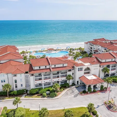 Breathtaking ocean views, resort-style pools, onsite restaurant, steps to beach.