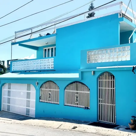 "Comfortable, modernized 5BR 4BA Home with an amazing Ocean View and breeze!