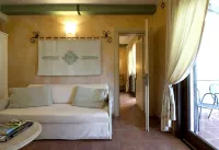 Appartamenti in stile resort sardo con 2 camere da letto, 7 posti letto - vasca da bagno