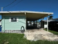 Canal-Front Coastal Escape with Private Dock & King Suite - Homestays