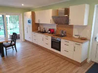 ~ Color magic red in Conneforde ~ with large terrace, garden, sauna, - Wi-Fi