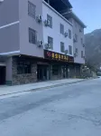 Muli Xinsheng Business Hotel