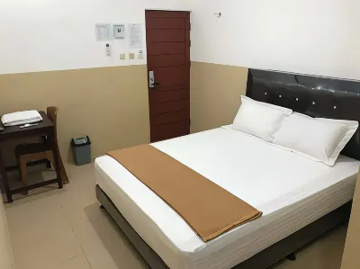 Homy Inn & Cafe Hotel dekat Masjid Muhajirin Gerbang Permata Ketapang