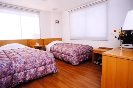 Business Hotel Yukuhashi Отели рядом со станцией JR Obase Nishikodai-mae station