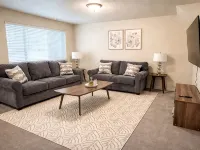 Spacious fully loaded 4-bedroom townhome sleeps 12 freeway access next to BYU Hotels in Springville
