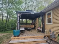 Relax in 3 bed, 2 bath house on quiet 2 acres with private lake.