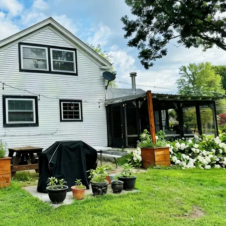 Experience the Charm of a Rustic Lakefront Cottage, Perfect for Year-Round Fun!