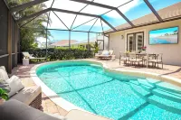 "Mediterra" /WALK to Vanderbilt Beach/ Heated Pool/Gym/BBQ/Scooters/4BR Retreat - Gym