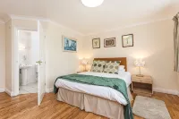 The Well Guesthouse - Inns