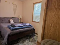 Relax in 3 bed, 2 bath house on quiet 2 acres with private lake.
