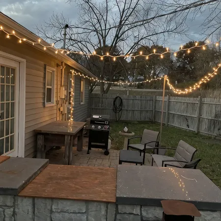 Near Kansas City Area Cottage with a Fire Pit! Comfy Beds and a Stocked Kitchen.