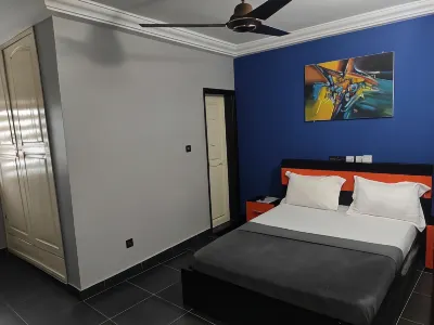 Room in Guest Room - Royal Blue Guest House Bar Hotels in Lome