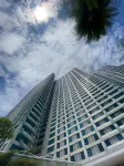 Studio Room with Netflix at Apartemen Grand Kamala Lagoon by Apartemenku