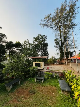 Red Stone Villas Coorg Отели в г. Мекери