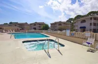 Quiet Condo with King Suite 4 Miles from the Beach,Private Balcony,Pool Hot Tub.