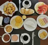 Trópico Praia Hotel - servizio colazione