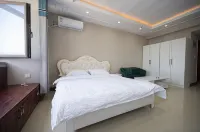 Zhaoyuan Junqi Homestay (Jincheng Building Branch)