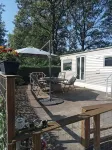 Cozy, mobile home Banjer at camping de Tien Heugten in Schoonloo Hotel di 