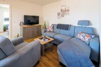 5 minutes from the Wadden Sea, vacation apartment with sauna